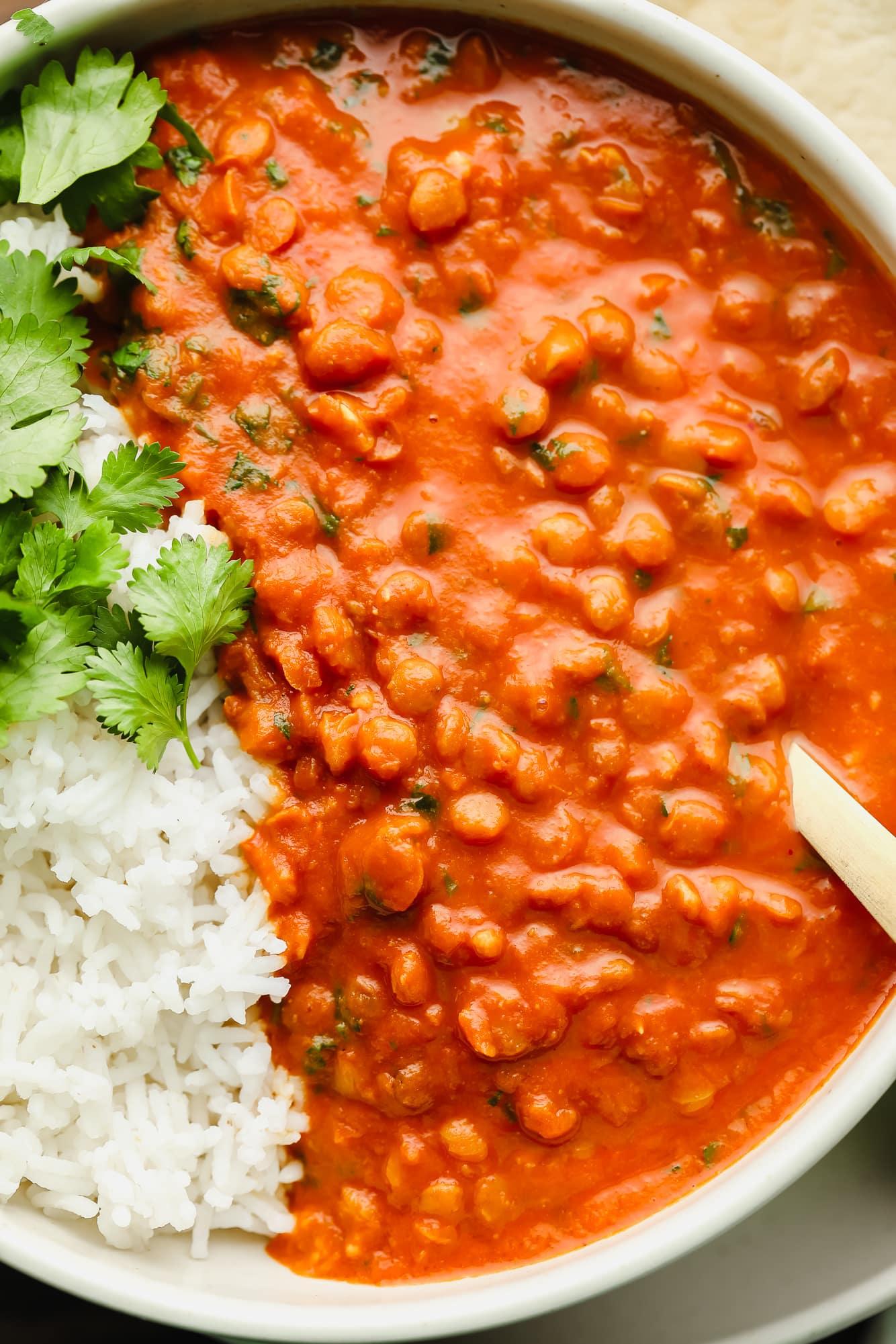 A close up image of the lentil mixture and the curry sauce