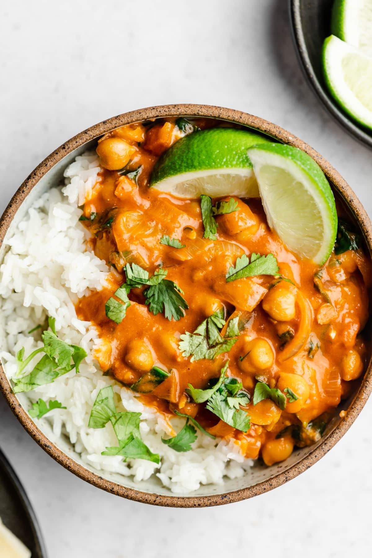 Close-up shot of a bowl of chickpea curry with rice