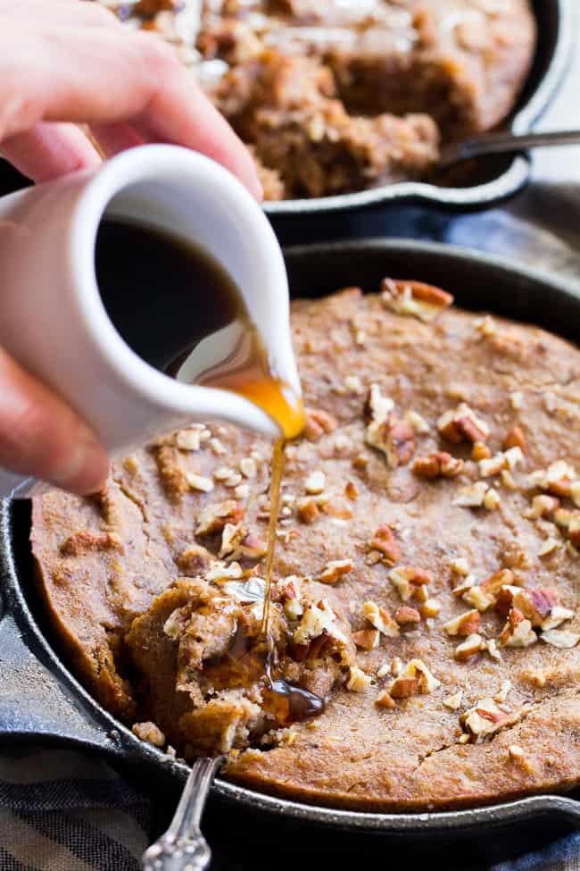 ingredients for paleo banana cinnamon pecan bowl laid out on a wooden surface