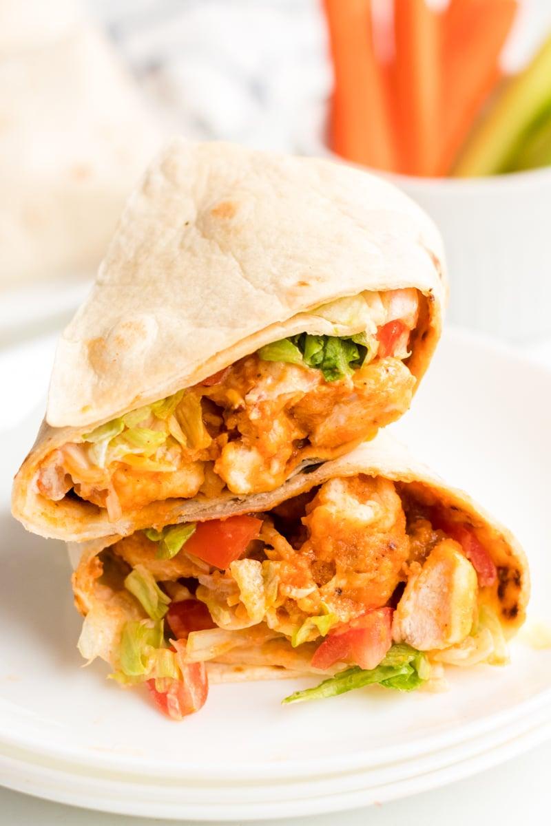 A platter of four buffalo chicken ranch wraps