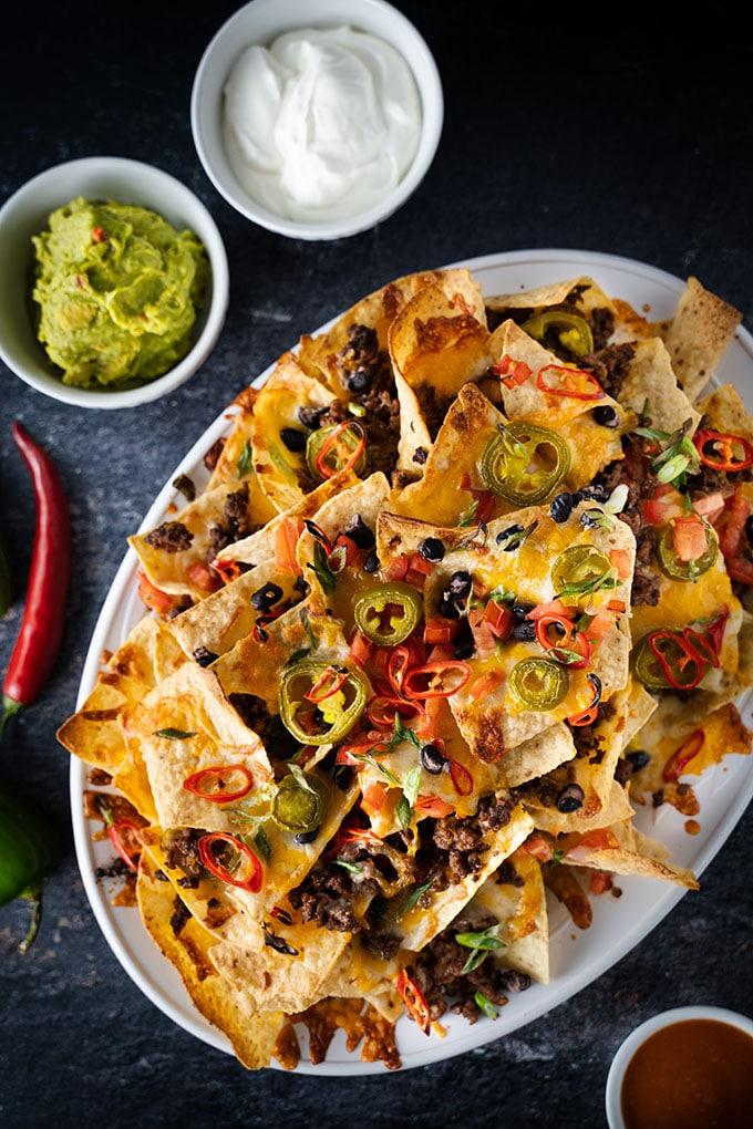 close up of perfectly layered game day dill nachos