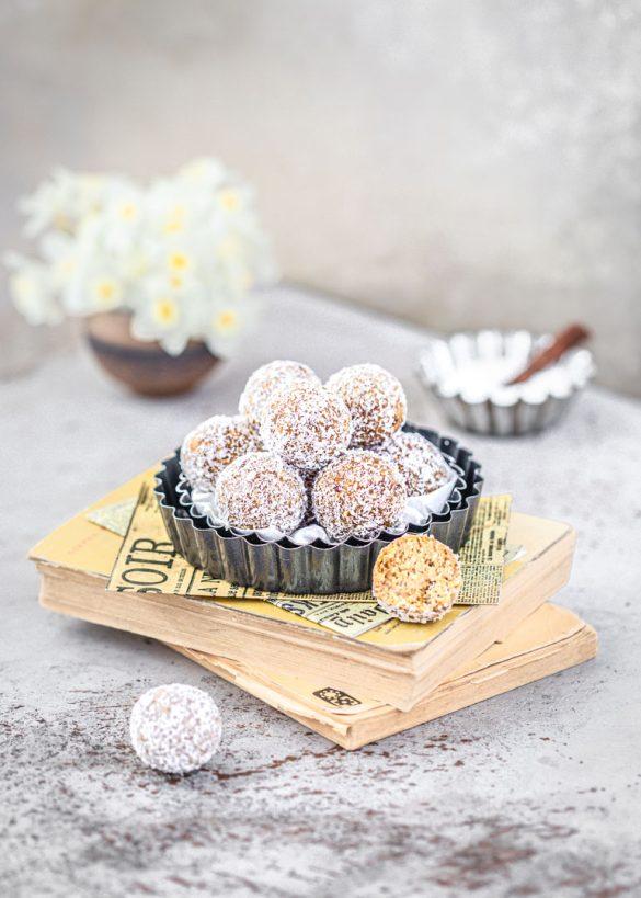 Ingredients for walnut and date bliss balls laid out on a kitchen counter