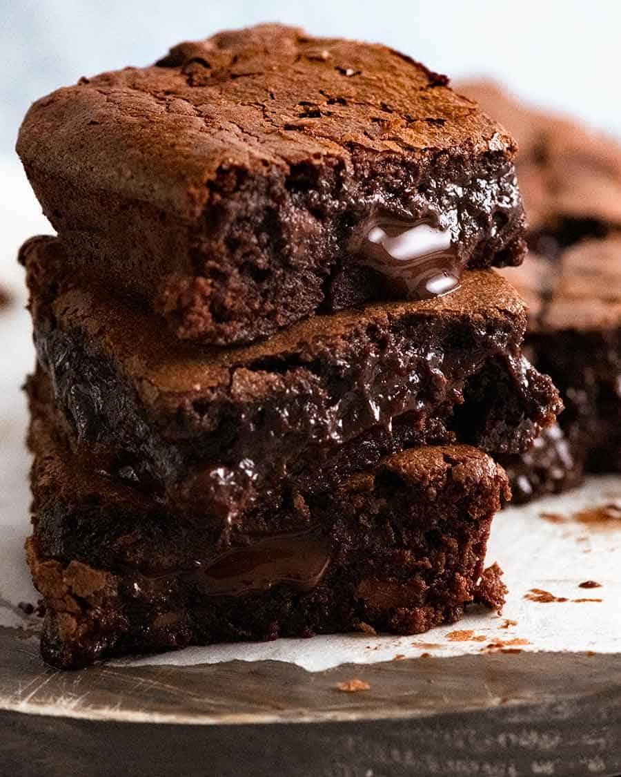 Gooey chocolate fudge brownie squares in a baking pan