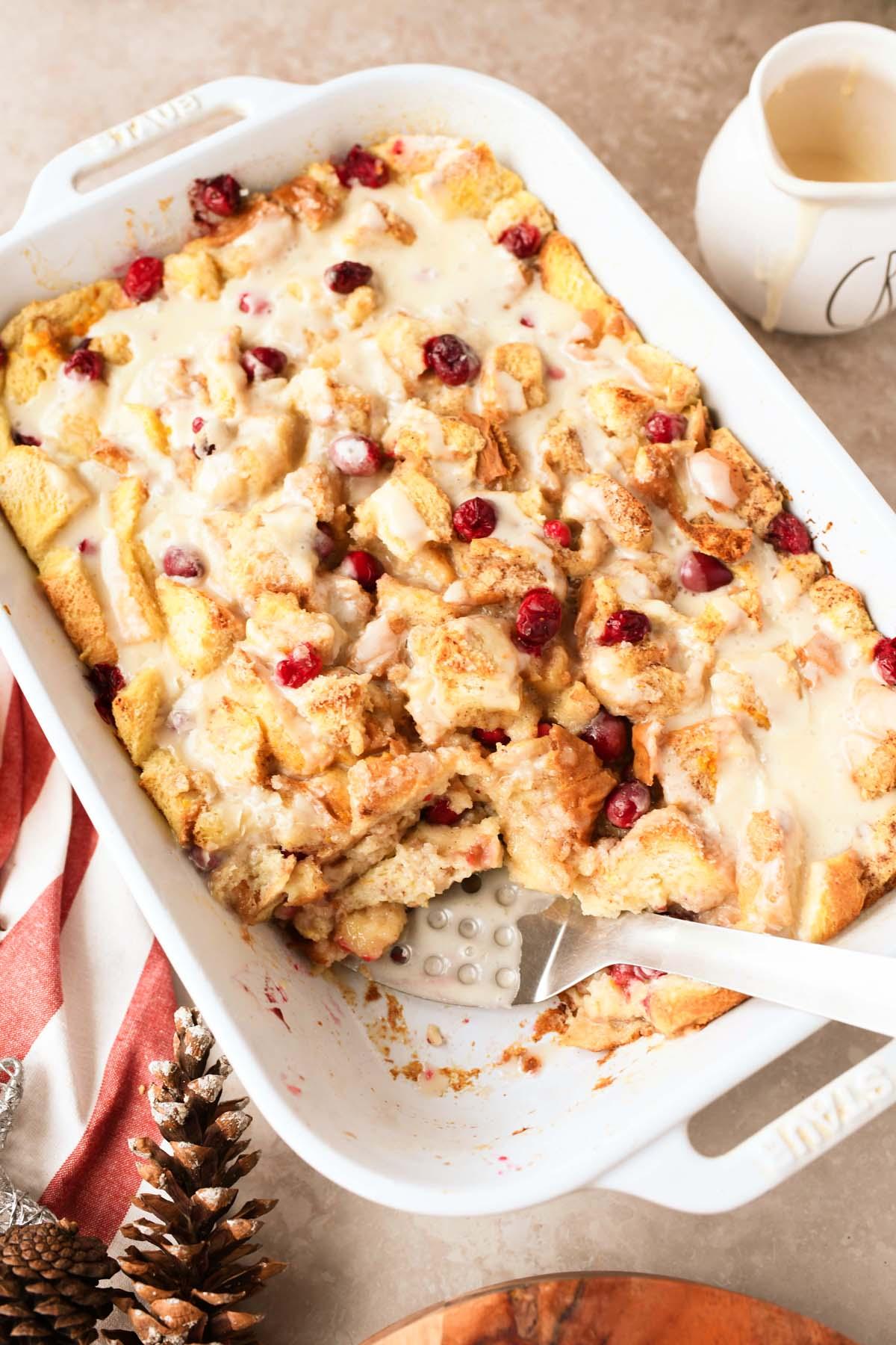 A rustic photo of Cranberry Orange Stale Bread Pudding with Almond Topping, showing the texture and ingredients