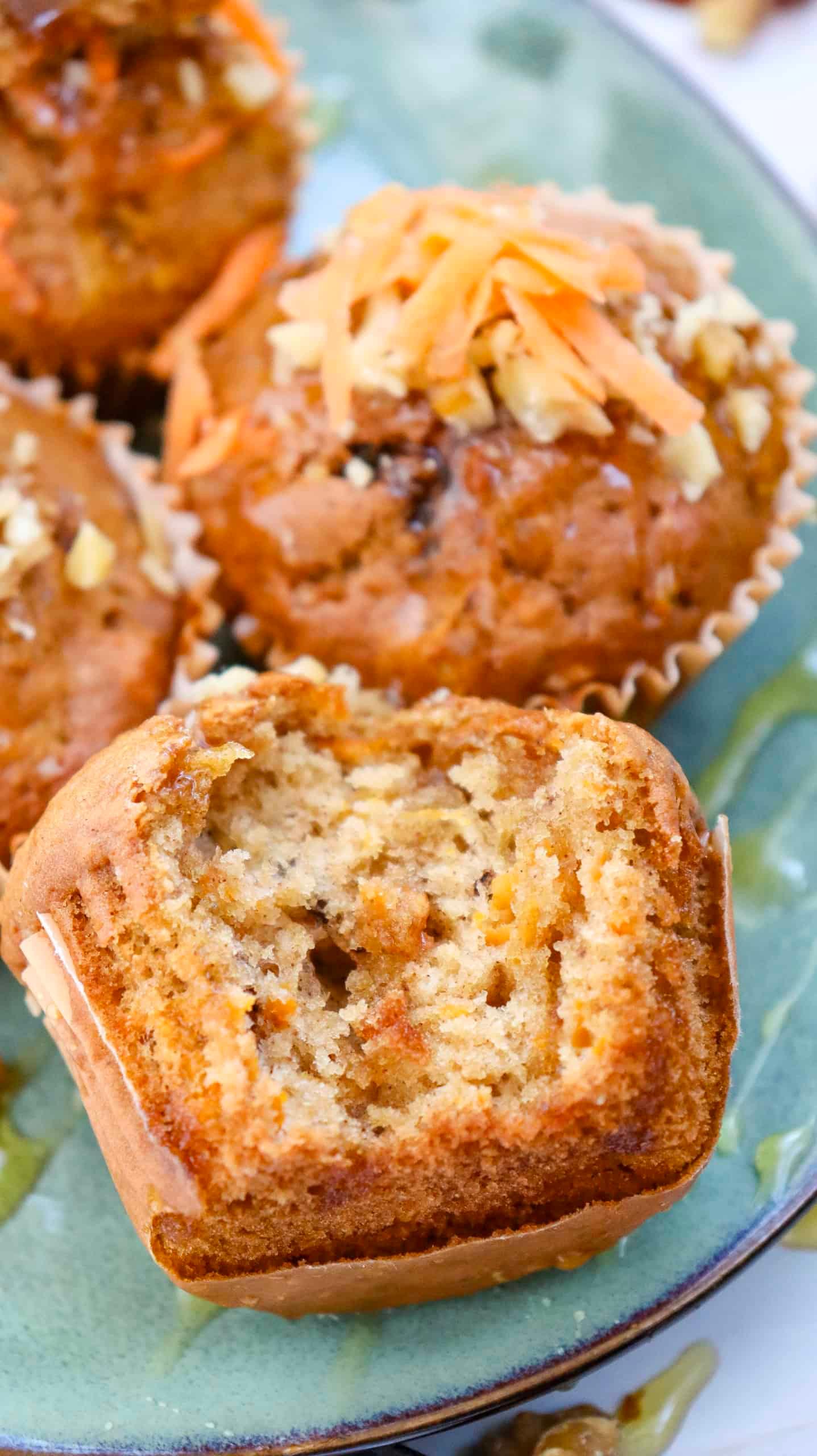 close-up of freshly baked carrot cake muffins with visible walnuts
