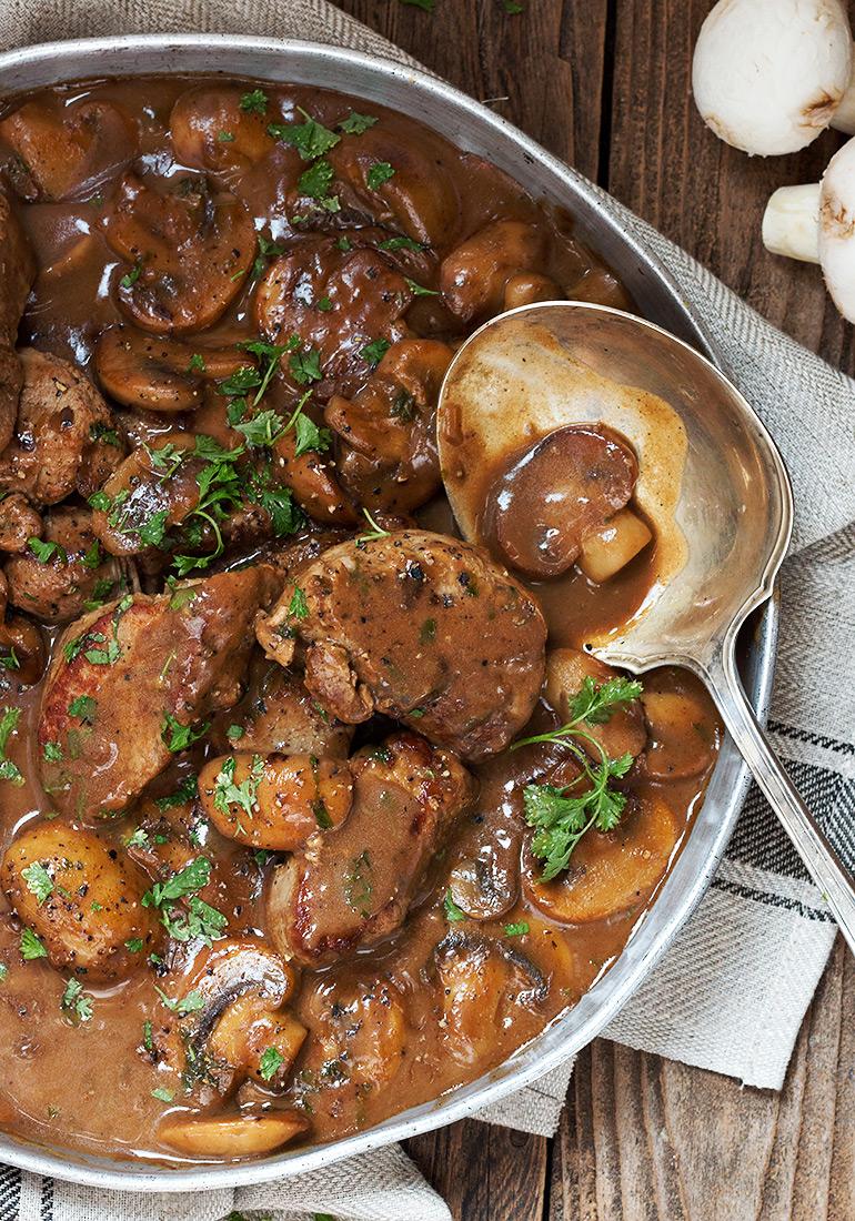 Roasted pork loin with mushroom sauce and side dishes