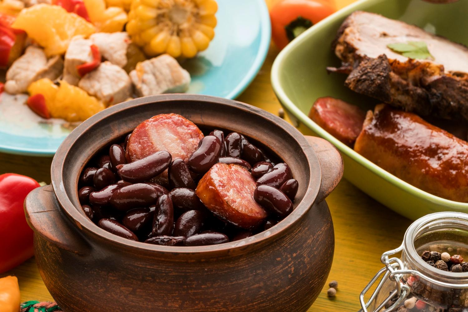 A person serving Feijoada to a group of people, highlighting the festive aspect.