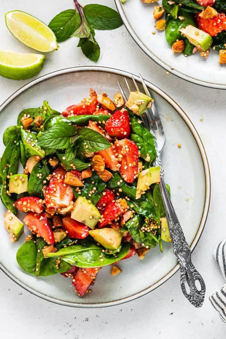 close-up of a bowl of strawberry spinach quinoa salad