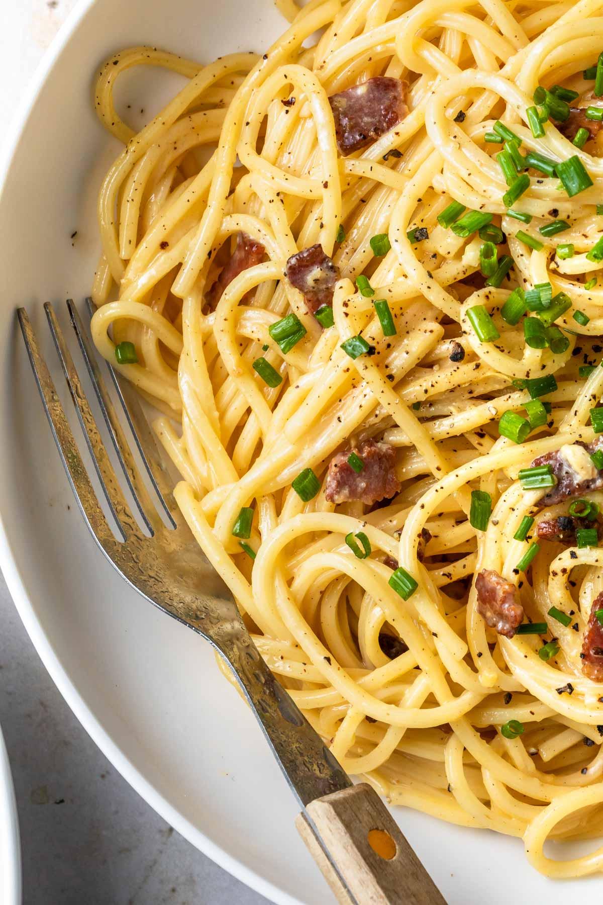 Close-up shot of creamy carbonara pasta