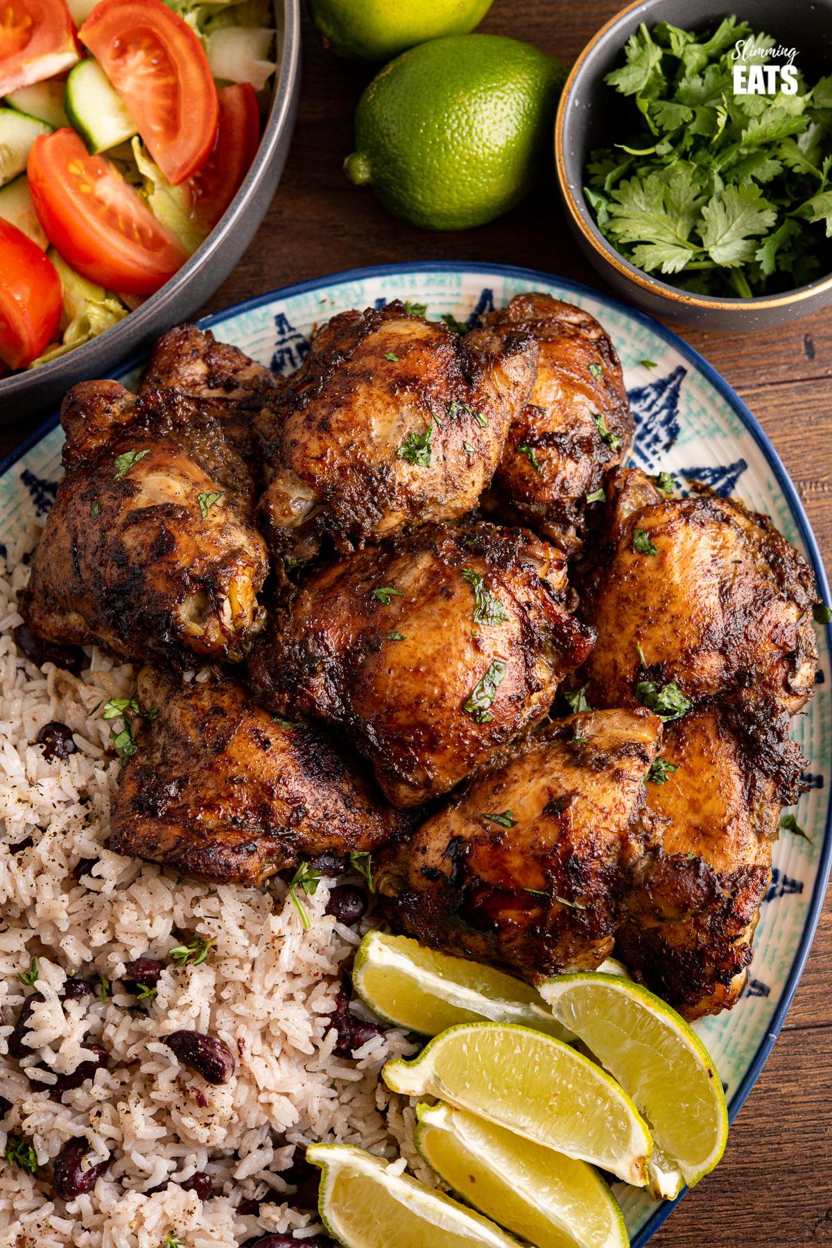 Close-up shot of delicious Caribbean jerk chicken with rice and peas