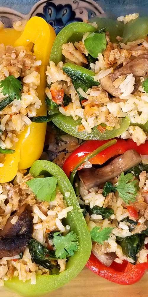 A table set for dinner featuring Thai Green Curry Stuffed Peppers