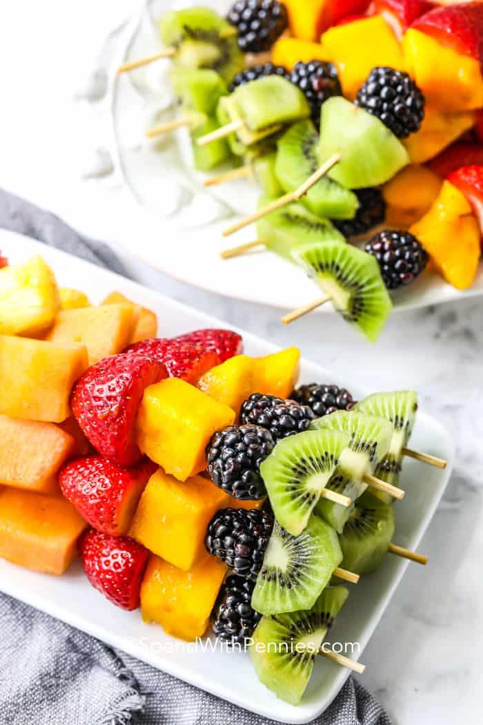 close up of colorful fruit spears with a variety of fruits