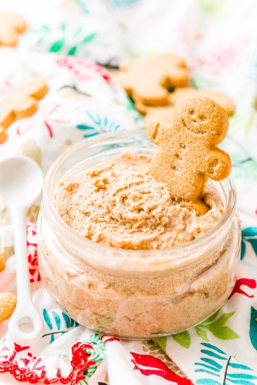 woman using gingerbread sugar scrub in shower