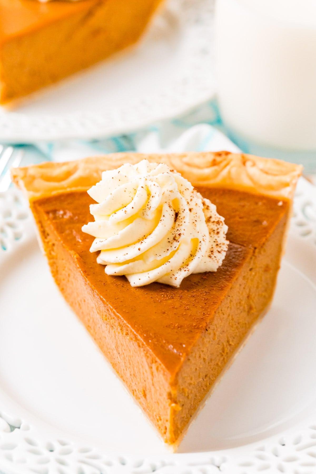 close-up of a slice of old-fashioned pumpkin pie showing the distinct custard layer