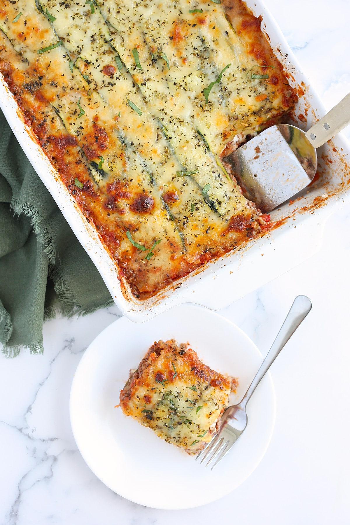 A full shot of a 9x13 inch baking dish filled with zucchini lasagna, ready to be served.