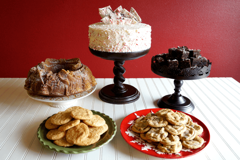 overhead shot of several peppermint bark polenta cakes arranged on a festive holiday platter