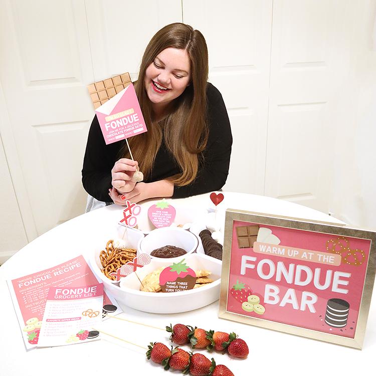 A person smiling and dipping strawberries into a chocolate fondue, warm and inviting atmosphere