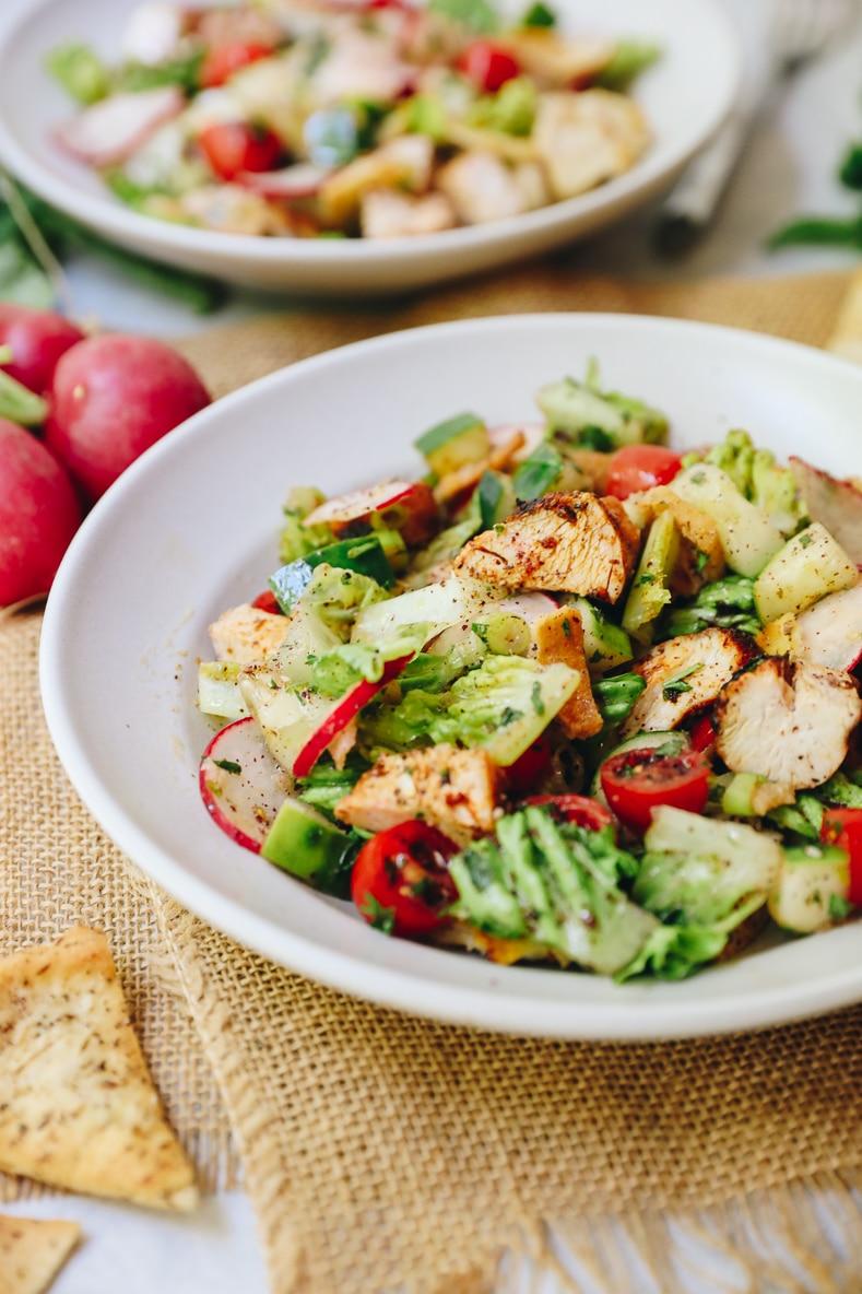 coffee cardamom fattoush salad served alongside grilled chicken