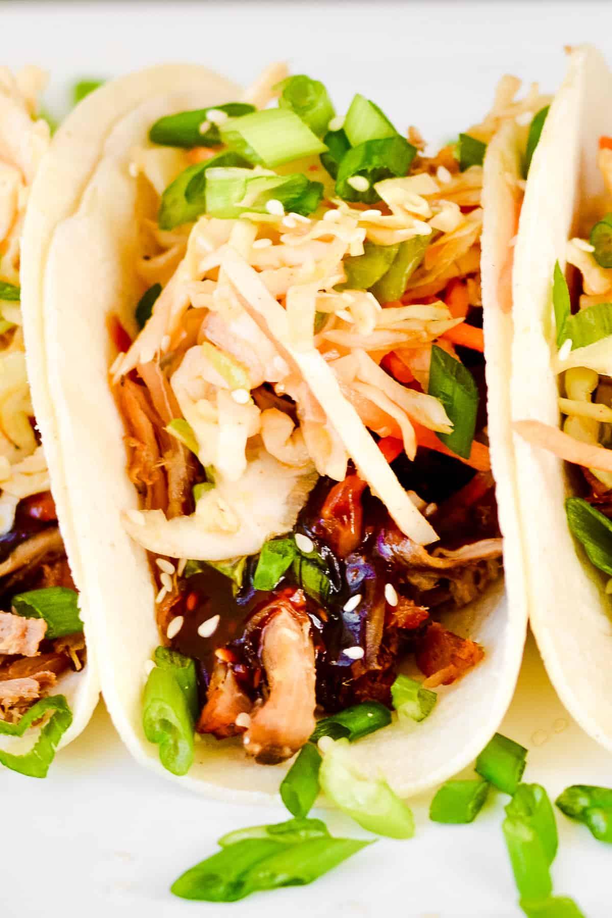 Close-up shot of Kimchi Carnitas Tacos