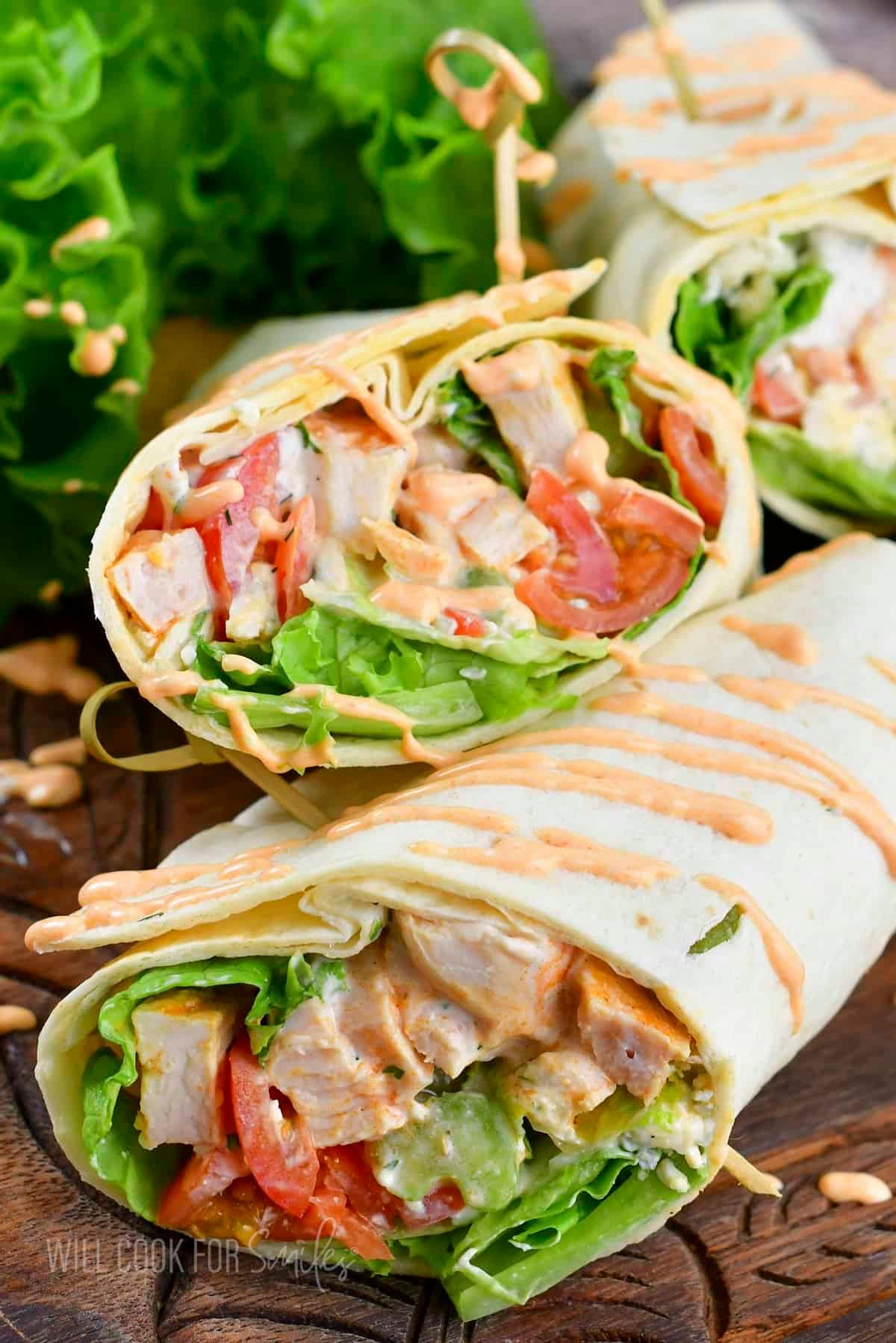 Close-up shot of delicious buffalo chicken picnic wraps, ready to eat.