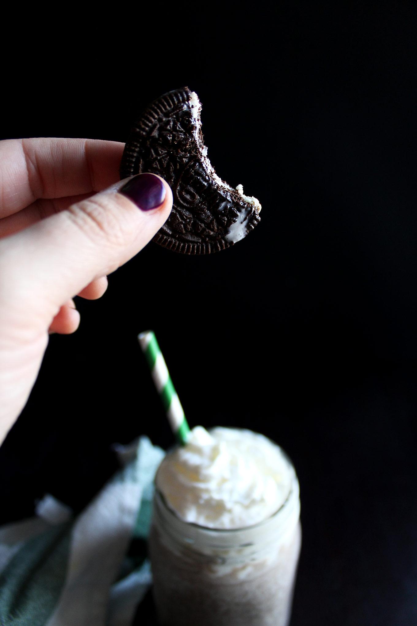 A person enjoying a Cookies and Cream Smoothie.