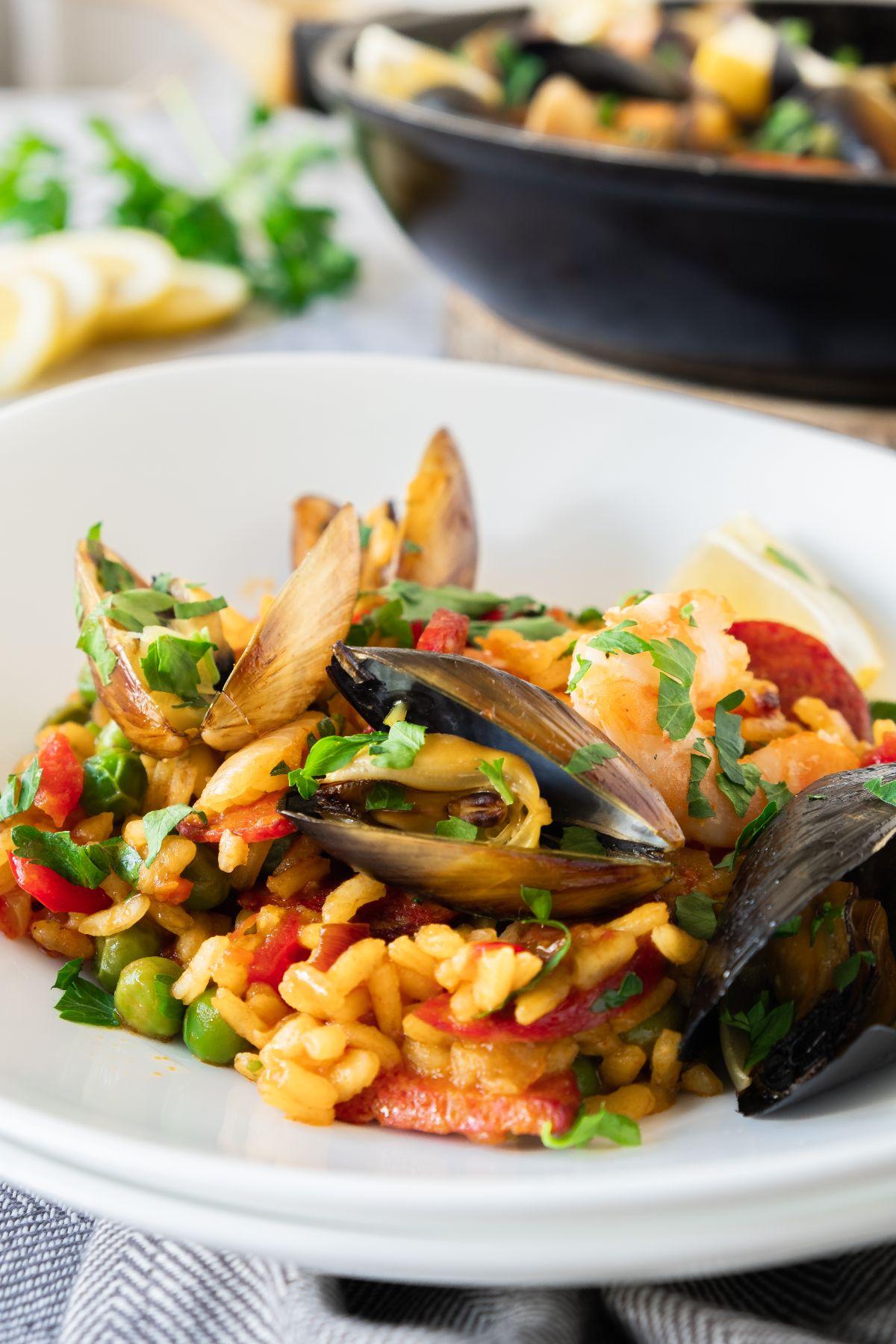 Close-up shot of Instant Pot Chorizo Paella with Mussels, showcasing the rice texture and colorful ingredients