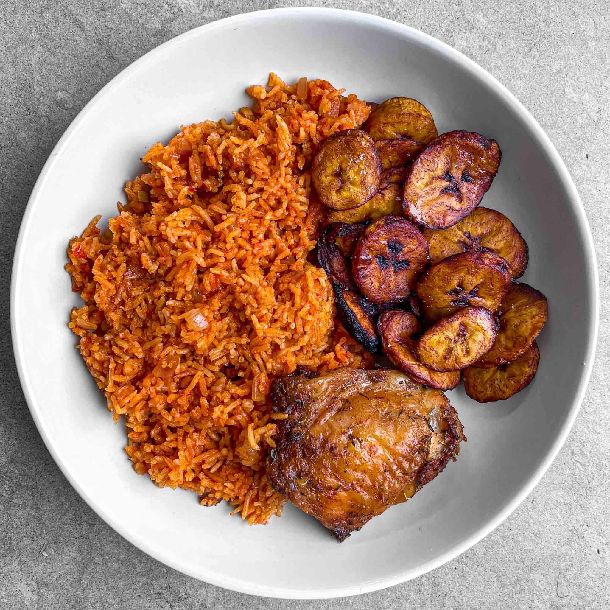 Jollof rice being served in bowls