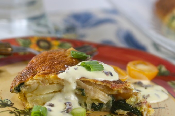 lavender and honey frittata served on a rustic wooden board