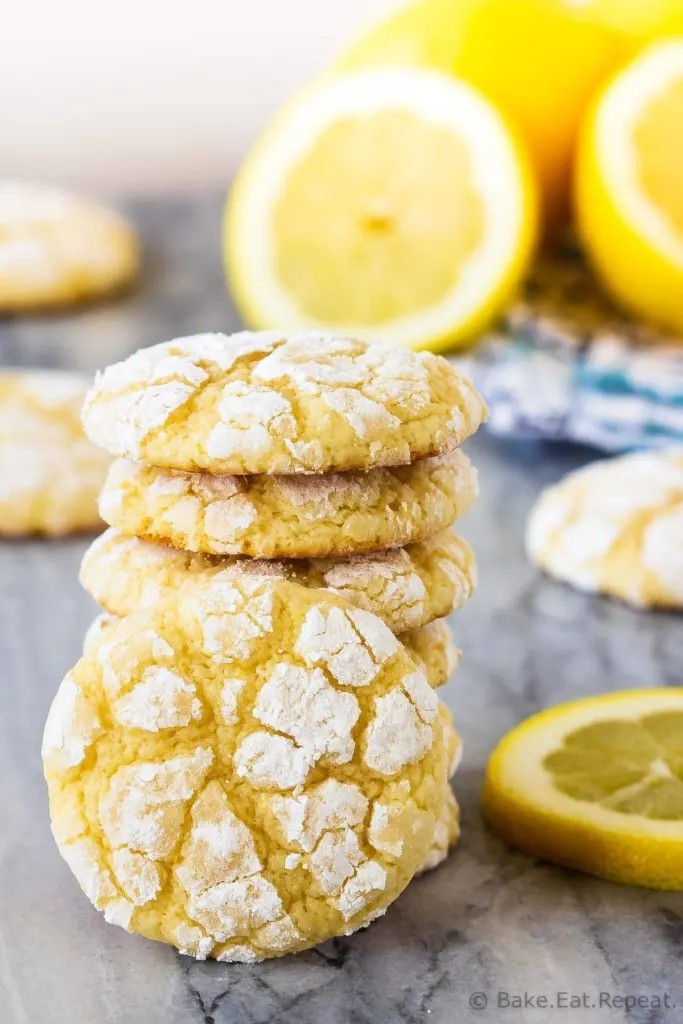 freshly baked lemon cookies with bright yellow zest and powdered sugar