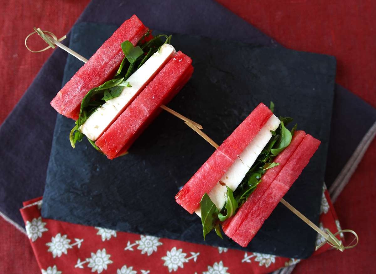 watermelon feta sandwiches on a picnic blanket
