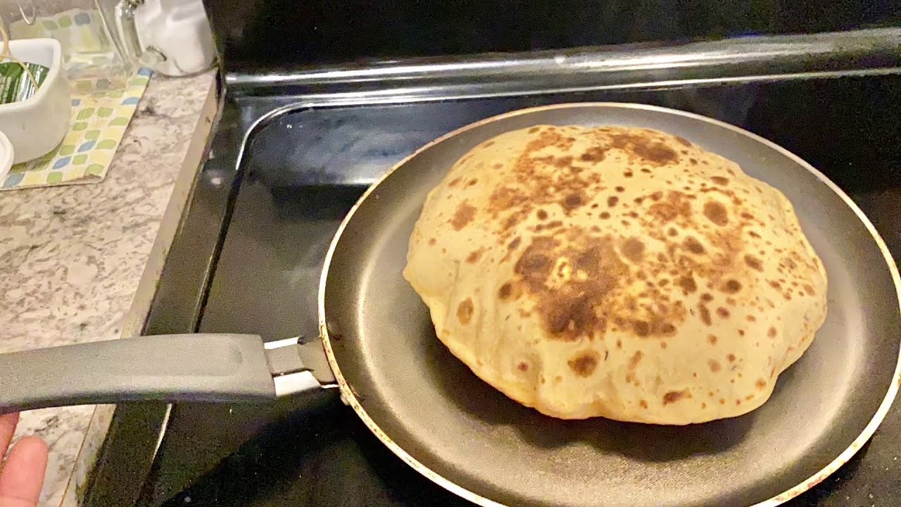 Lentil roti being cooked on a tava