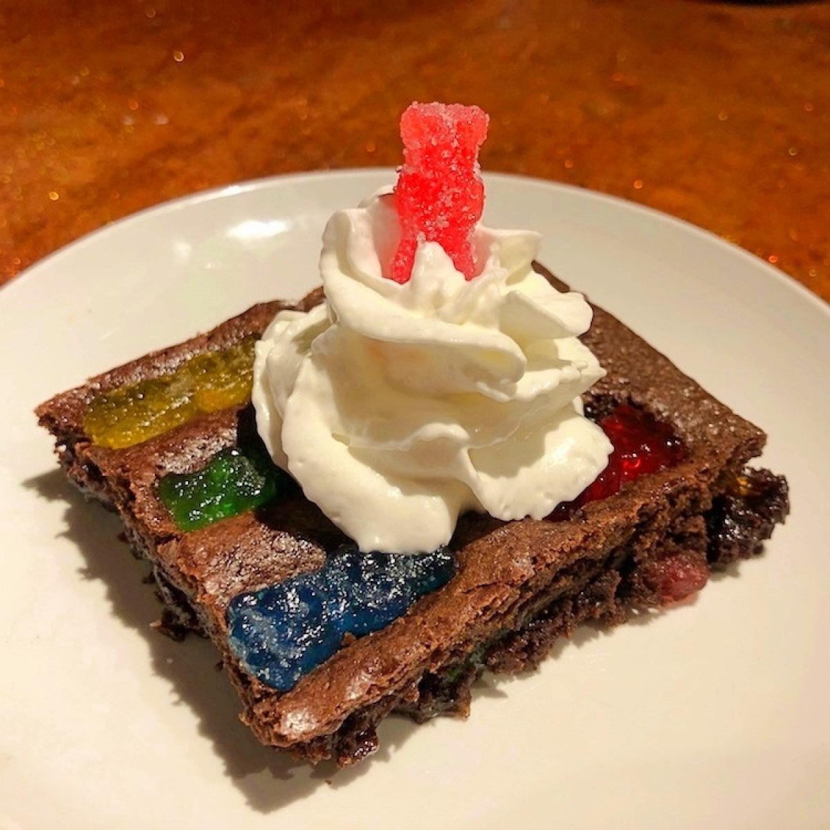 overhead shot of sour patch kid brownies with gooey center