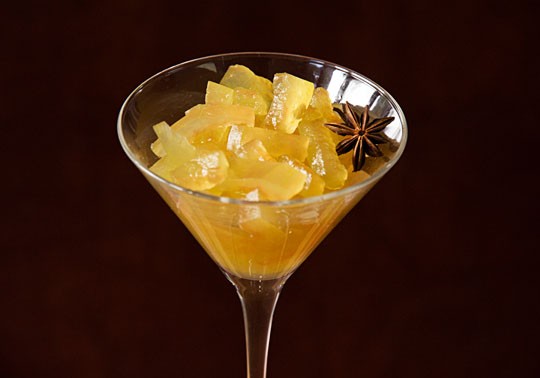 close-up of golden watermelon rind crisps with fresh mint garnish