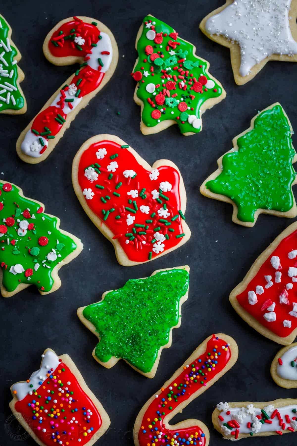 beautifully decorated sugar cookies with royal icing, close-up, festive, vibrant colors