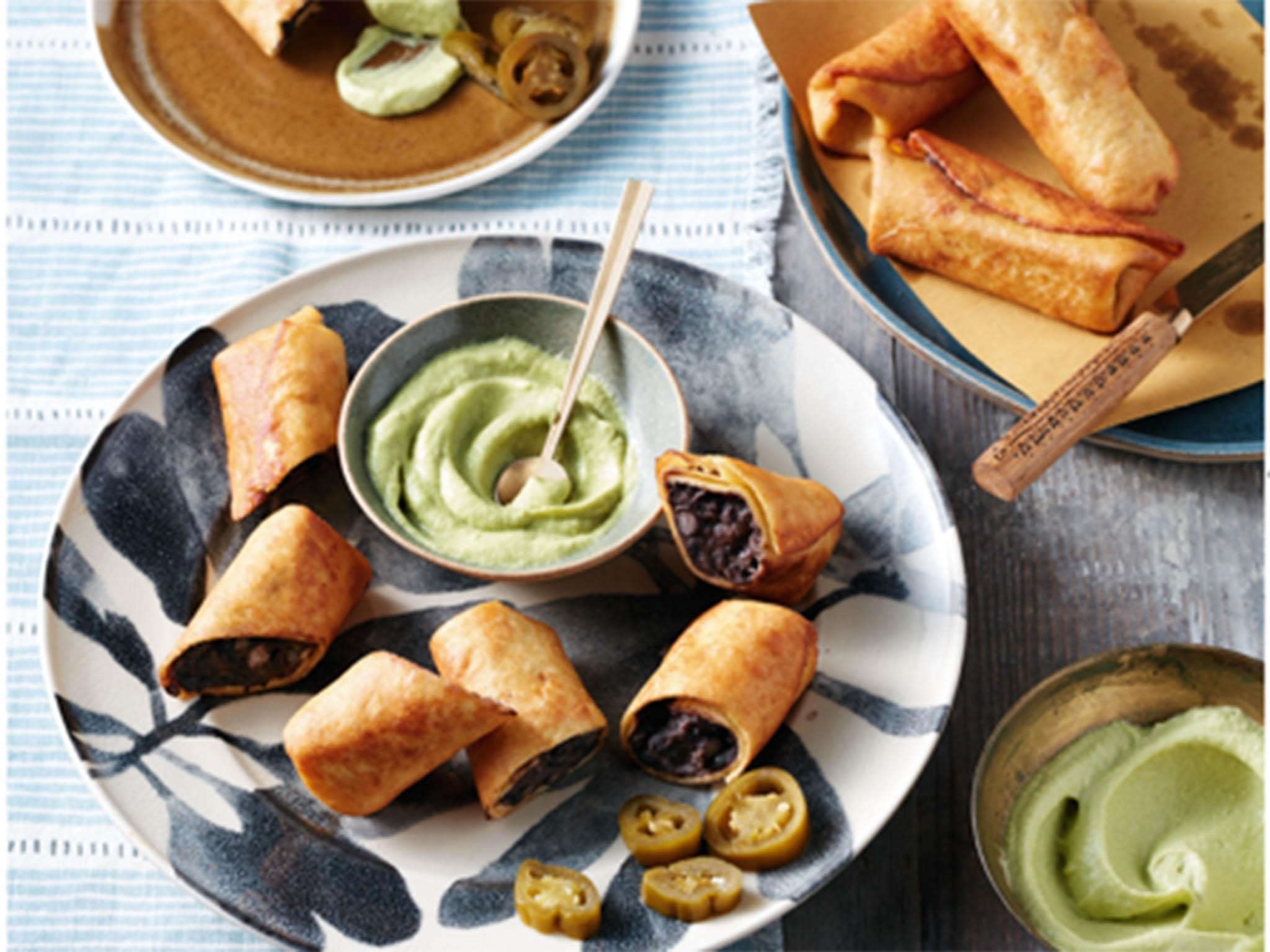 close-up of avocado and black bean spring rolls on a plate