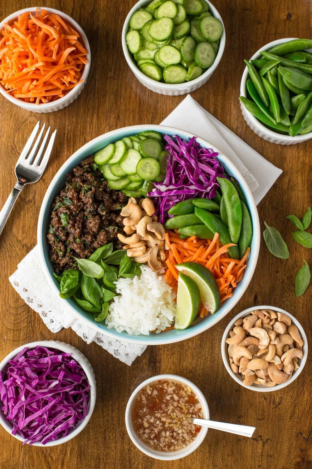 vibrant chili beef bowl with rice and fresh cilantro garnish, overhead shot