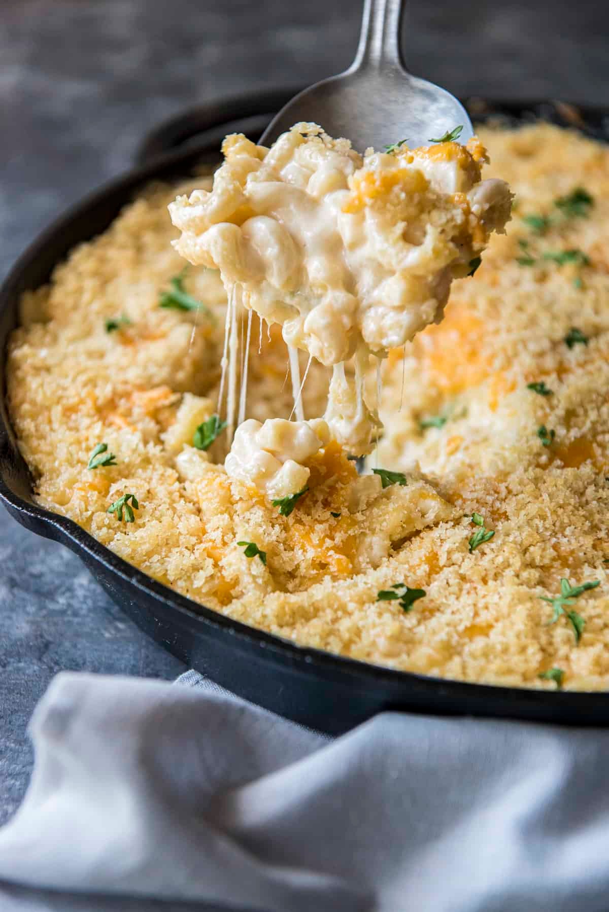 creamy mac and cheese in a cast iron skillet