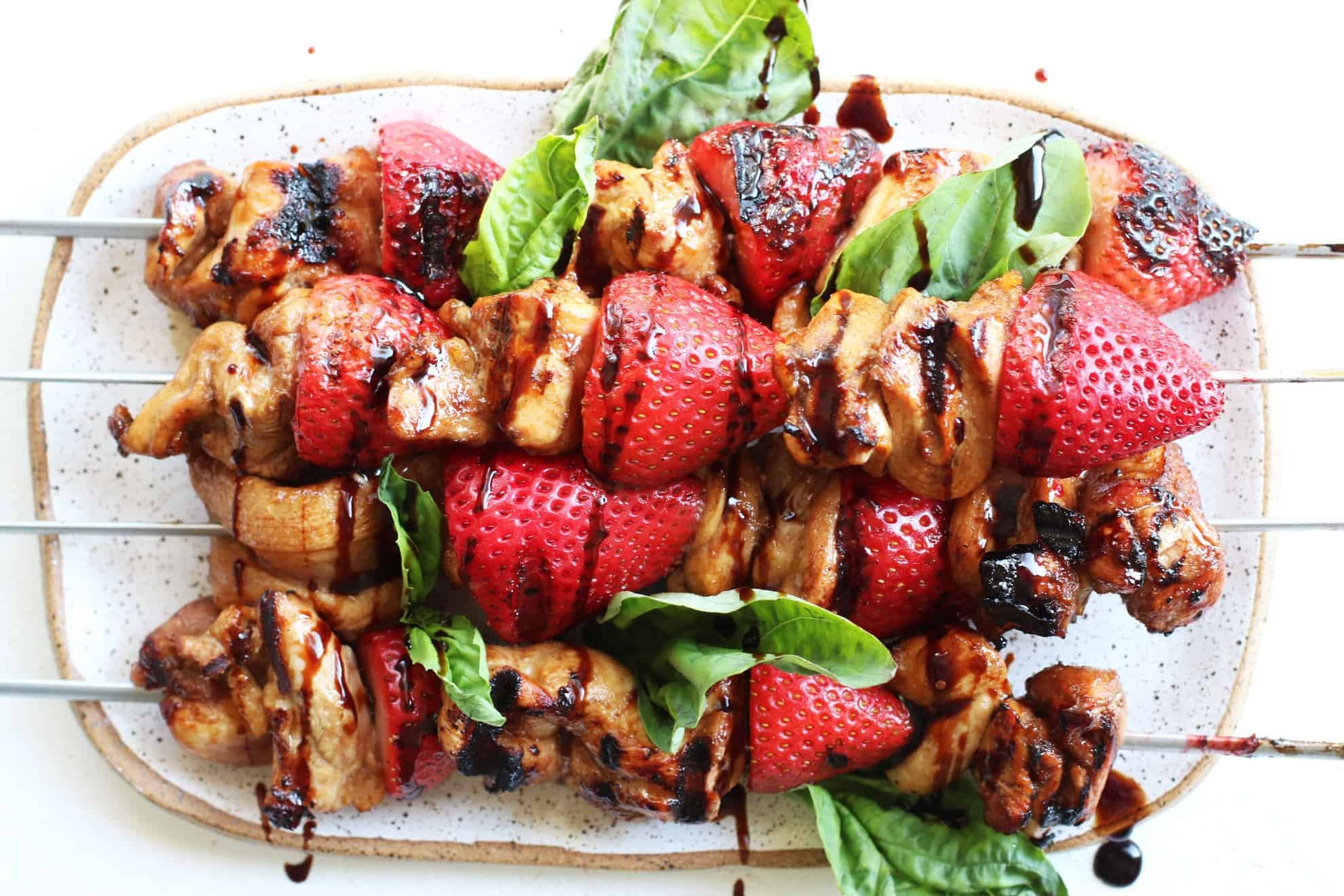 Strawberry Balsamic Chicken Souvlaki on a grill