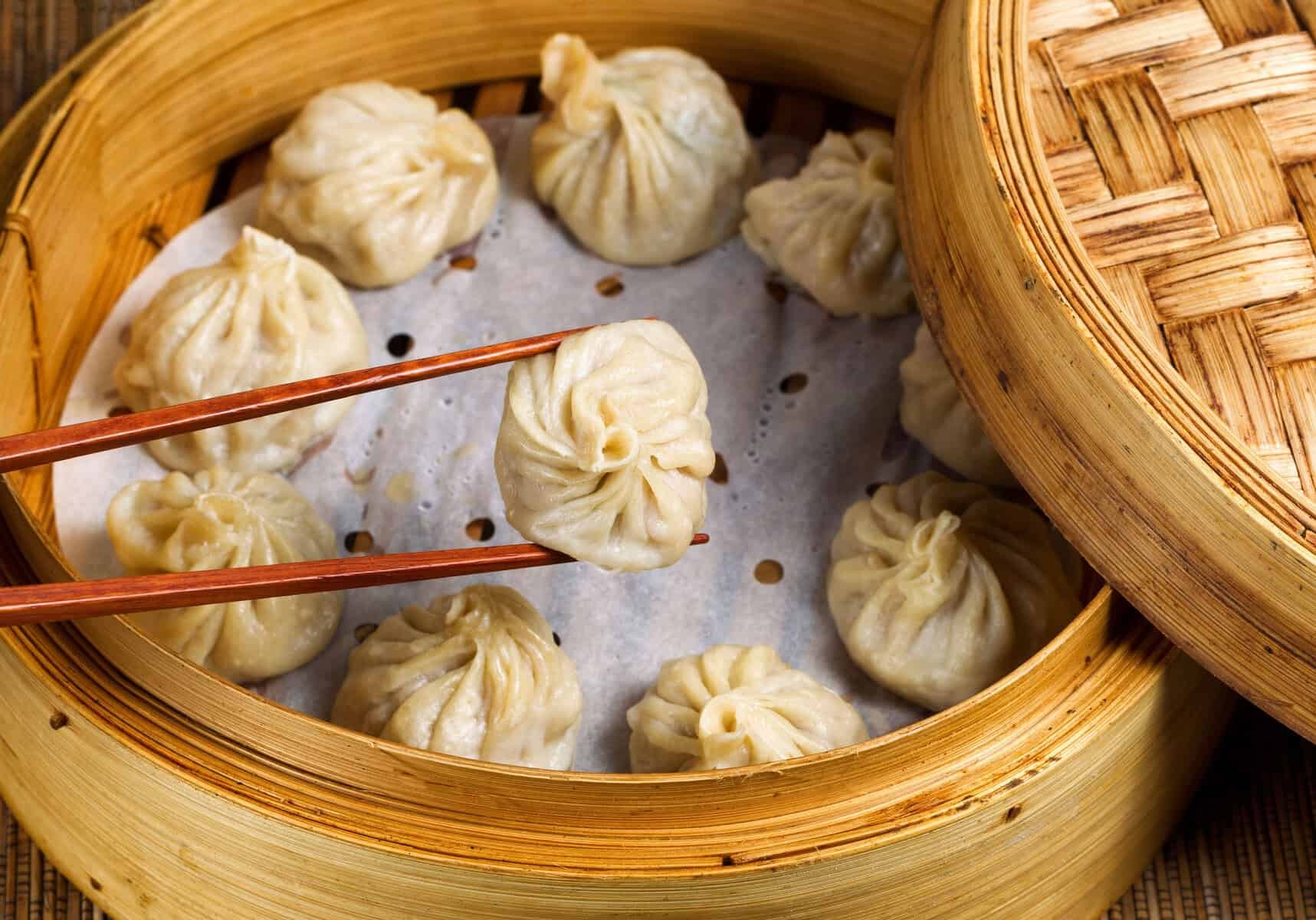 frangipane steamed dumplings on a bamboo steamer