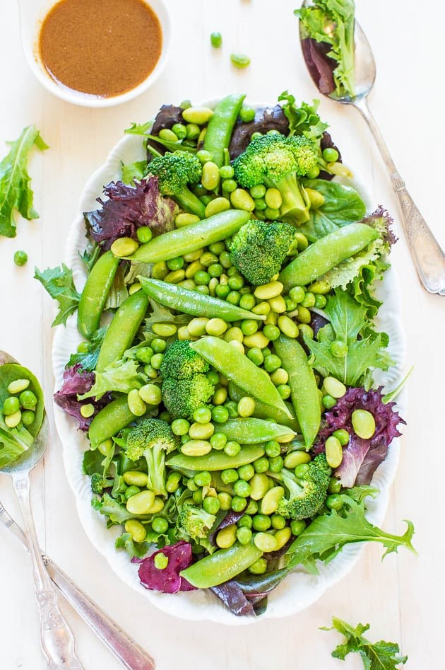 Edamame salad with sesame ginger dressing in a bright, natural setting
