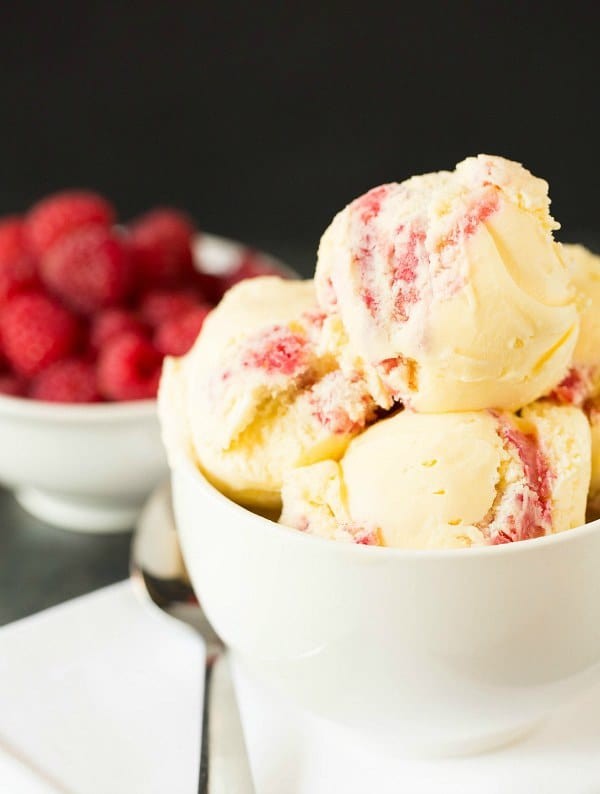scoops of homemade white chocolate raspberry swirl ice cream