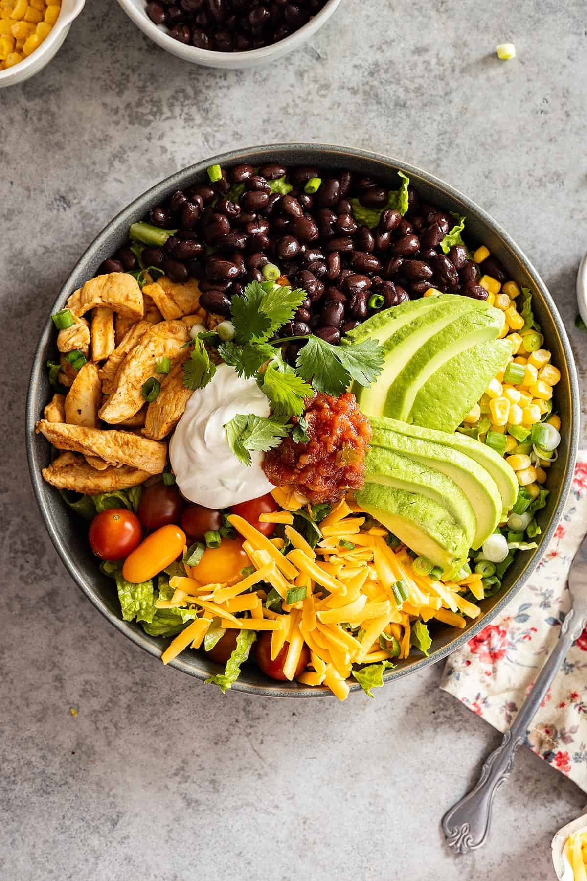 overhead shot of a colorful healthy chicken taco bowl