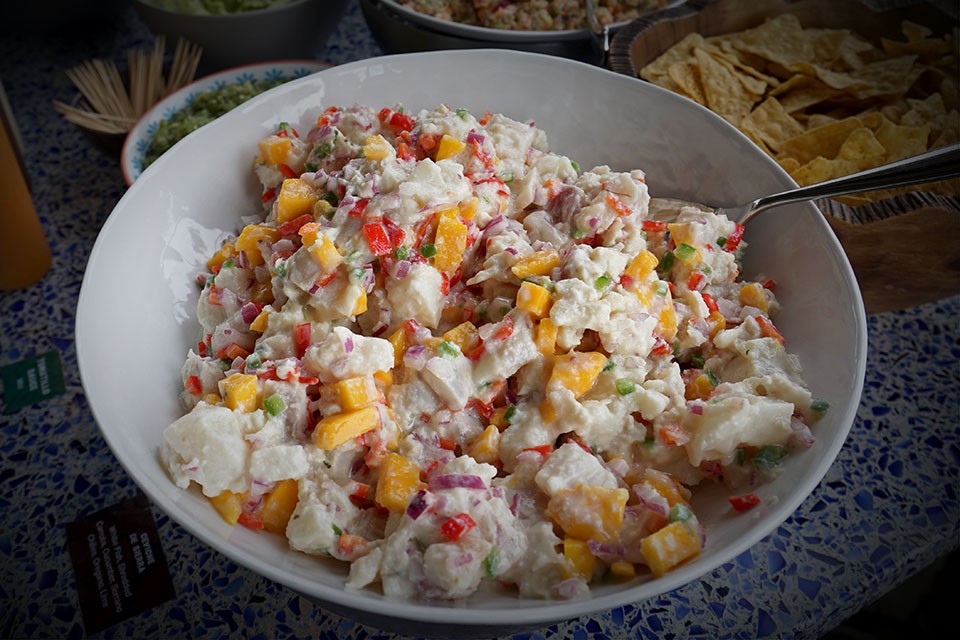 fresh tropical mango ceviche with coconut milk served in a bowl