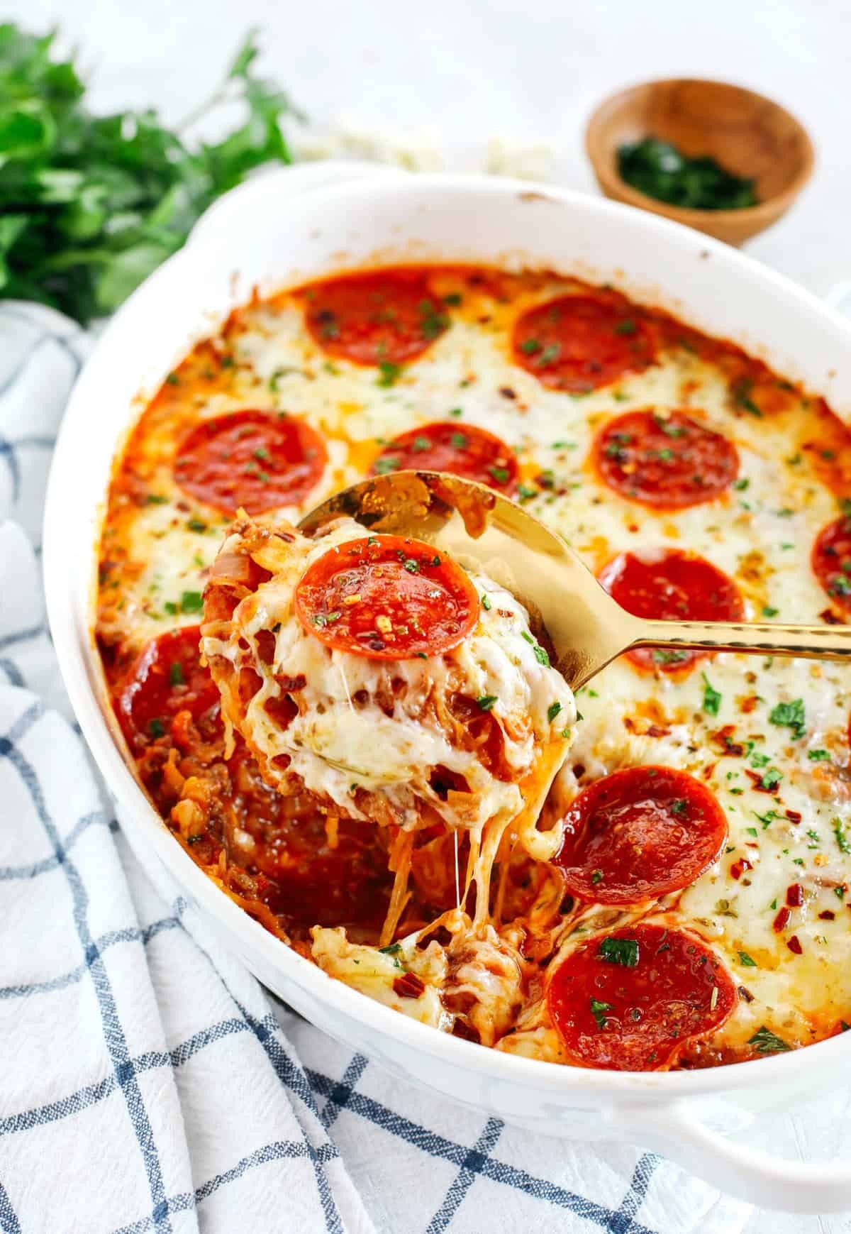 Spaghetti squash pizza with tomato sauce and mozzarella