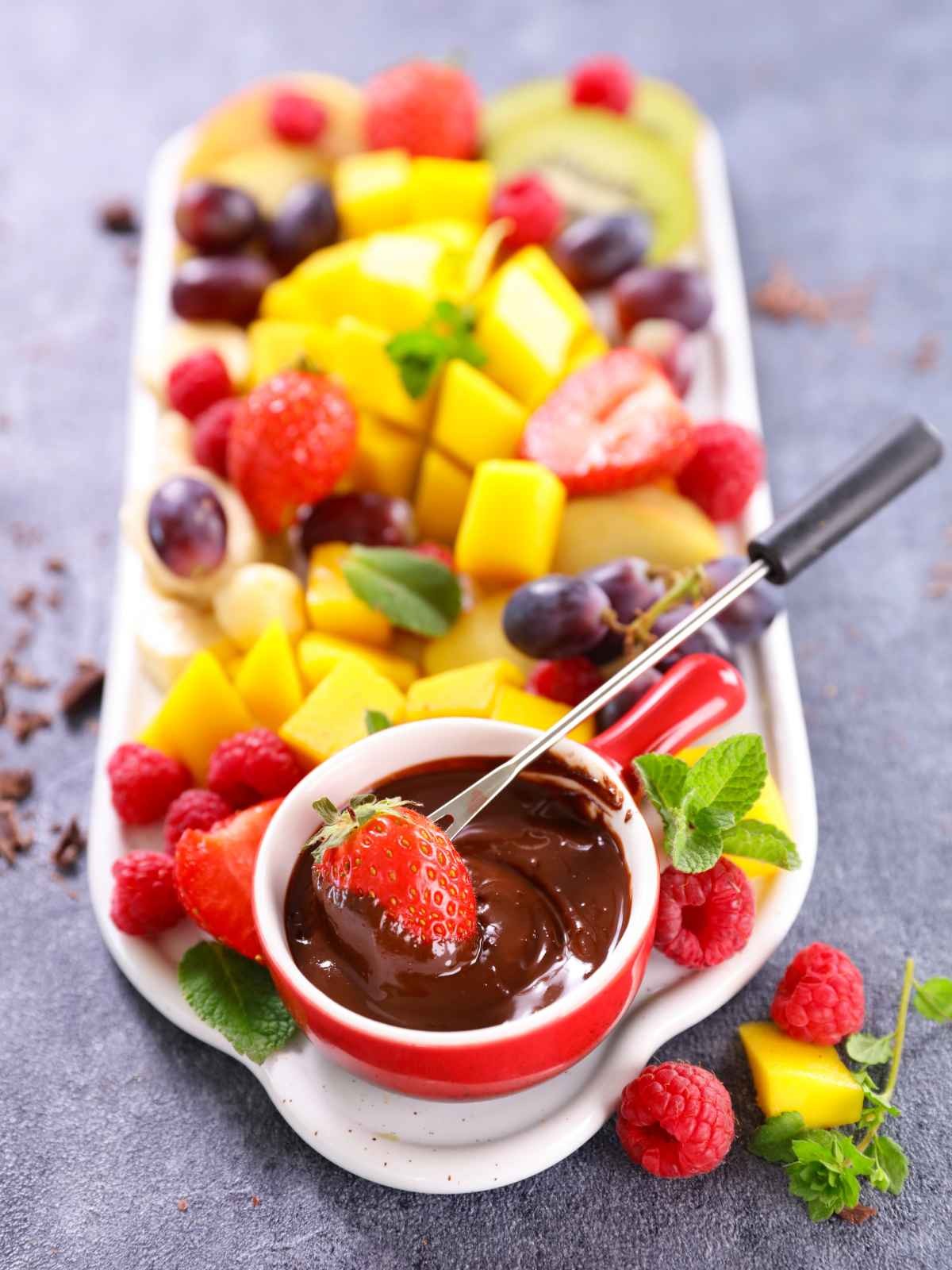 velvet chocolate fondue with fresh fruit and dippings