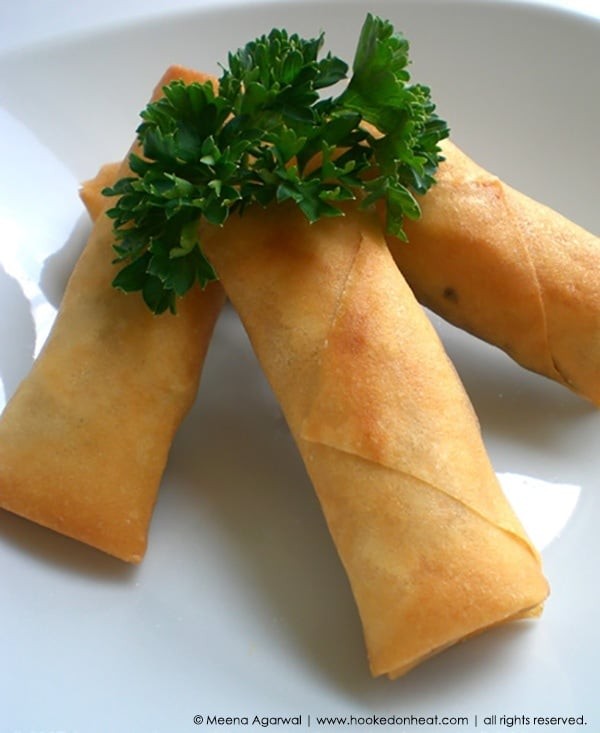 honey garlic chicken spring rolls being served