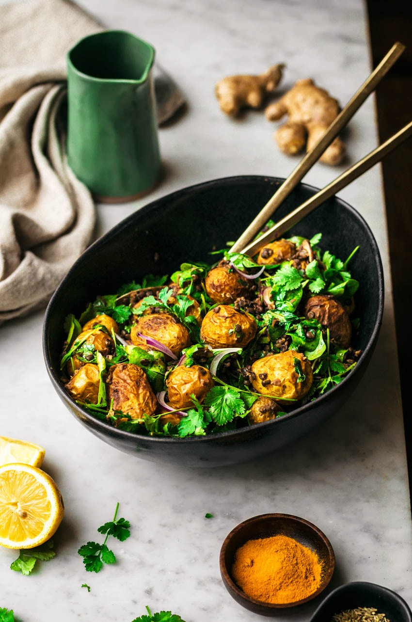 cumin and curry potato salad in a bowl