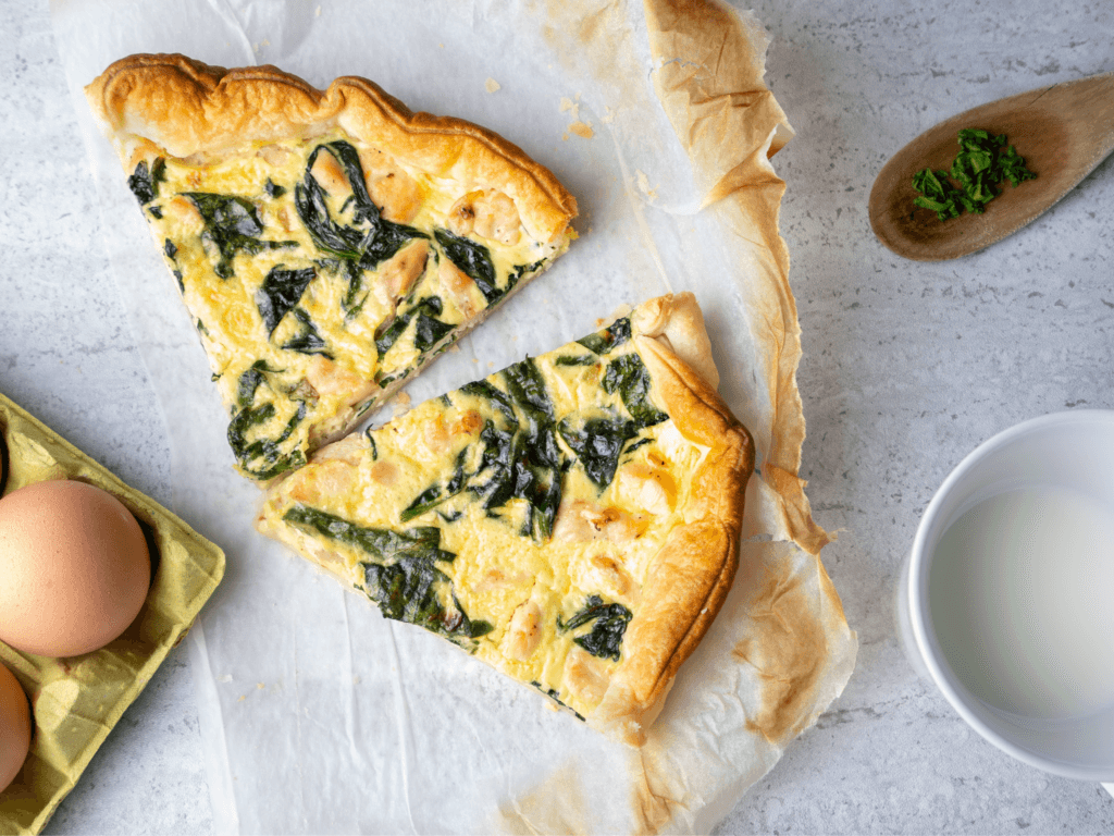 slice of swiss chard and feta quiche on a plate