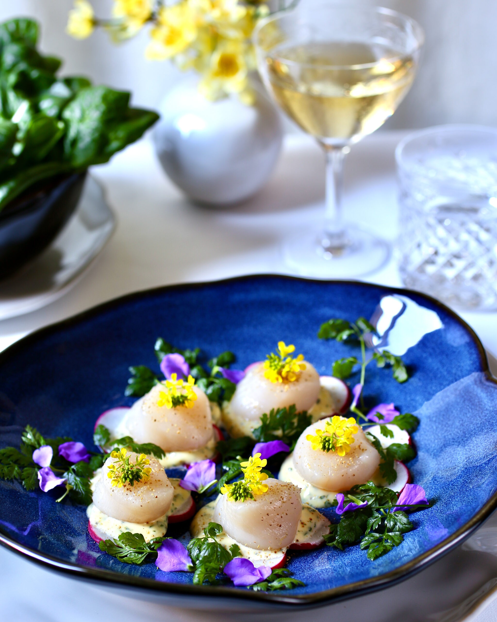 contemporary gravlax garnished with edible flowers