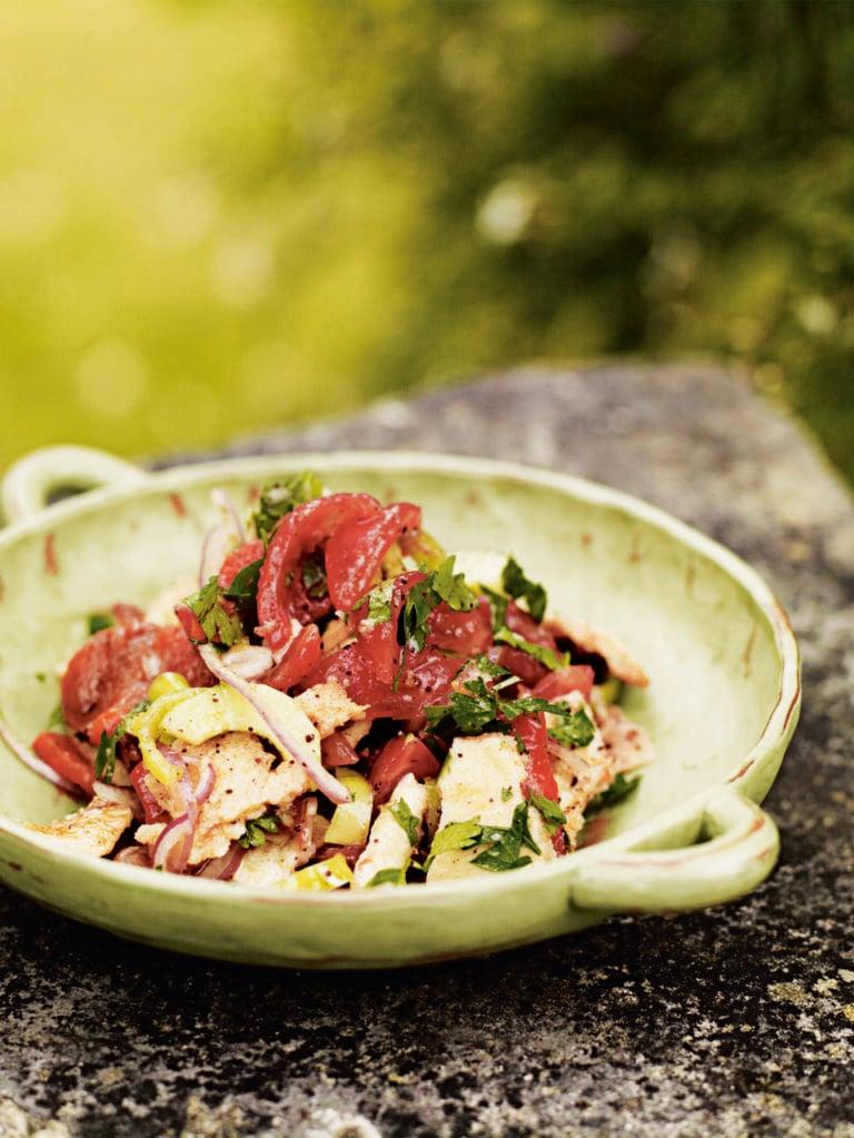 Close-up shot of a beautifully arranged Roasted Red Pepper & Walnut Fattoush salad